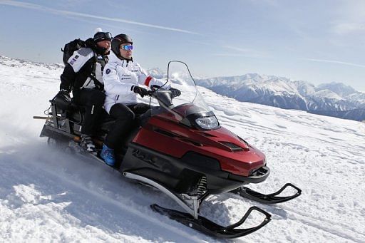 Dmitry Medvedev drives a snowmobile in Krasnaya Polyana, 50km from Sochi, on March 11, 2012